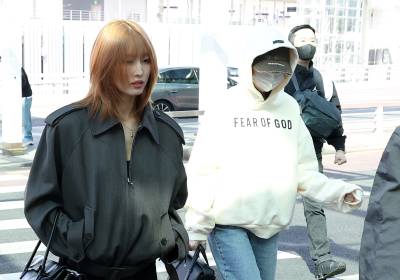 [포토]트와이스 모모-미나, 출국 위해 성큼성큼